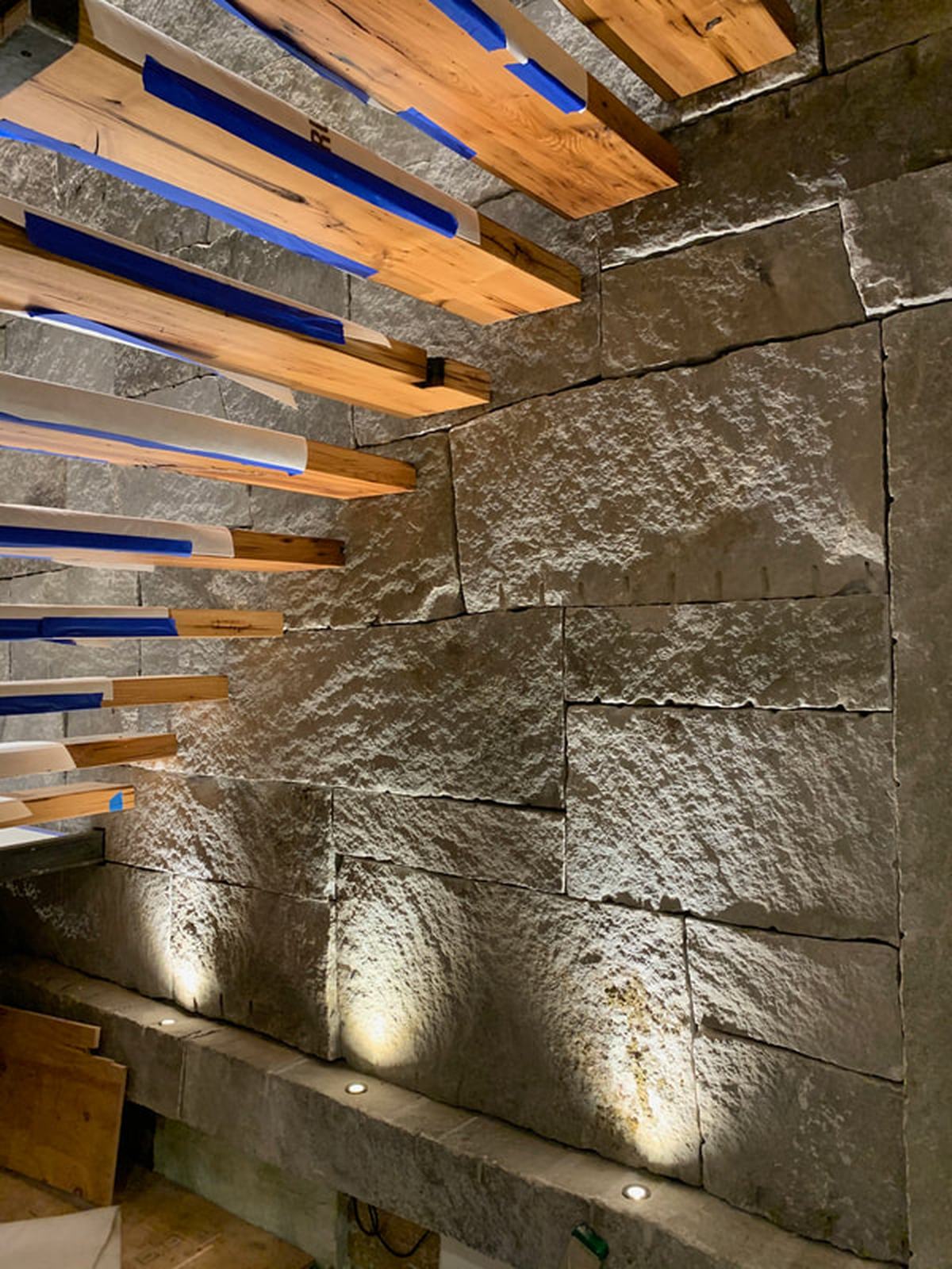 Fitzwilliam granite interior stone wall with lighting