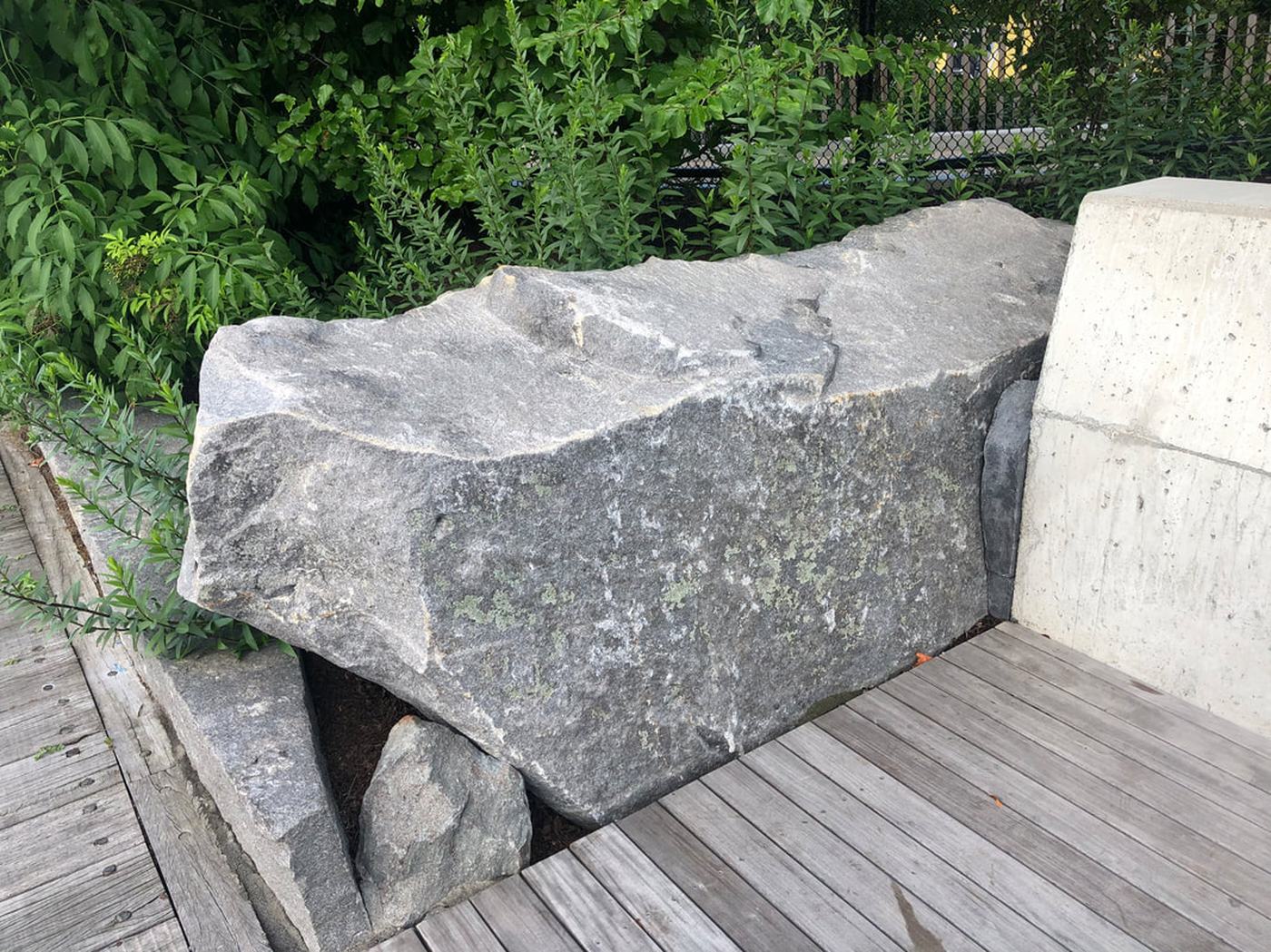 Granite boulder bench public installation