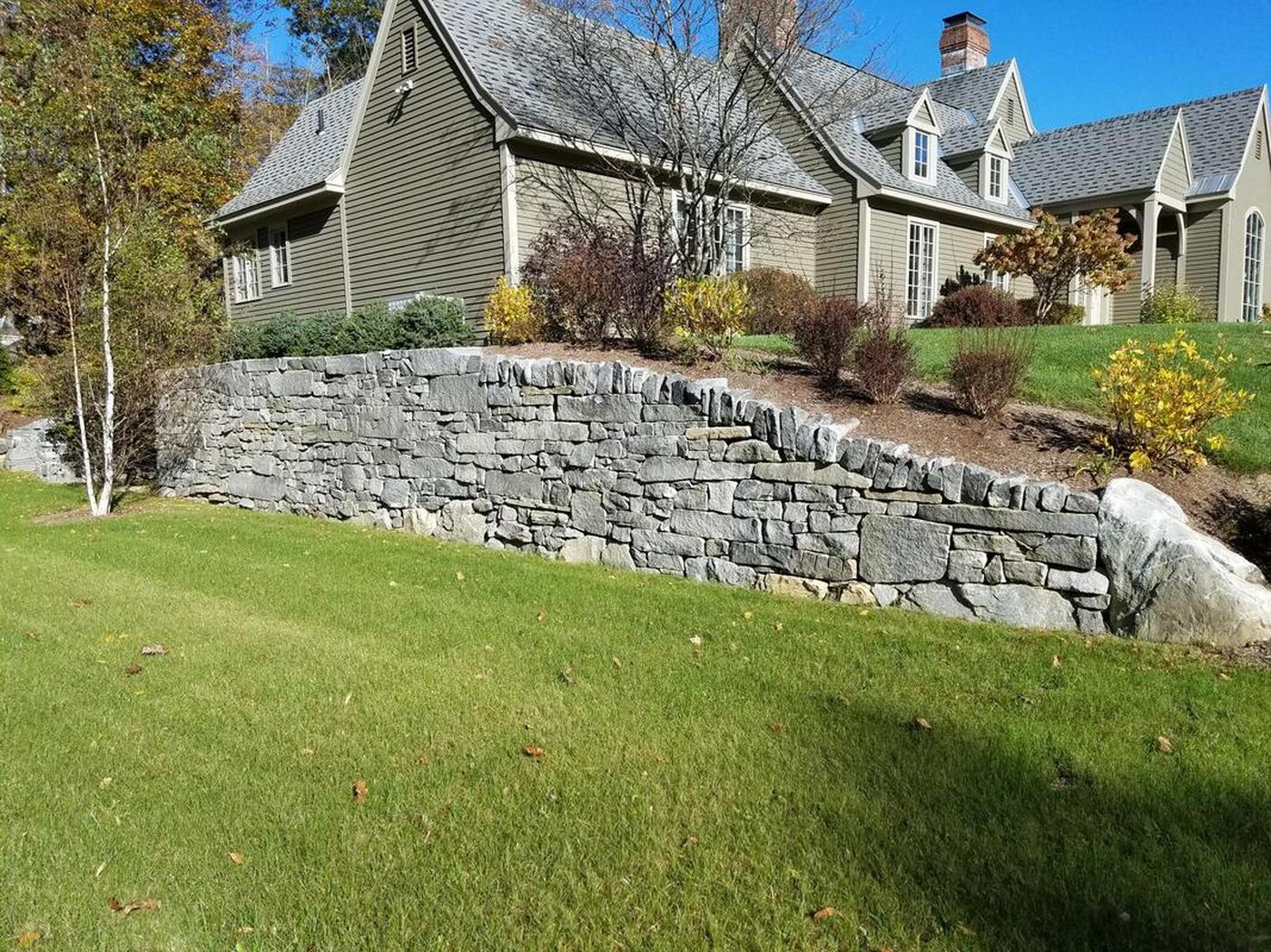 Dry-laid granite estate wall New England